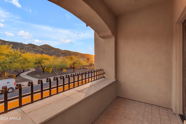 balcony featuring a mountain view