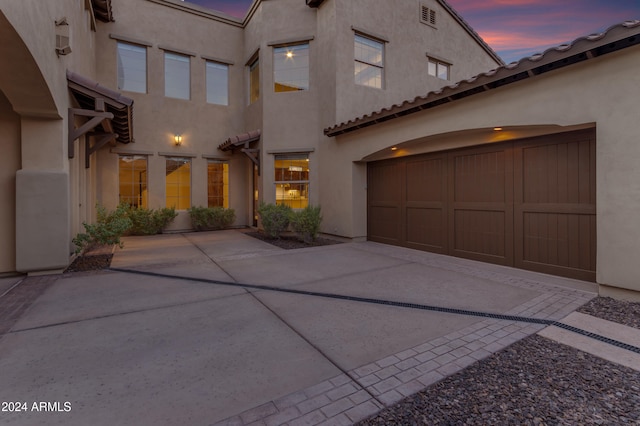 view of front of home with a garage