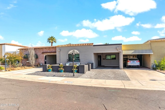 view of front of home with a carport