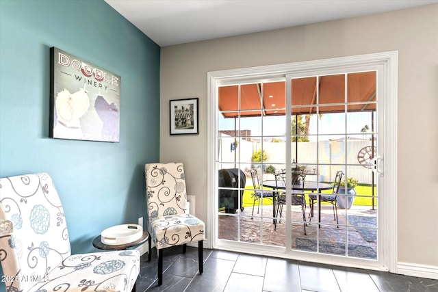 sitting room featuring tile patterned floors