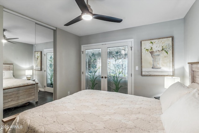 bedroom featuring french doors, ceiling fan, and multiple windows