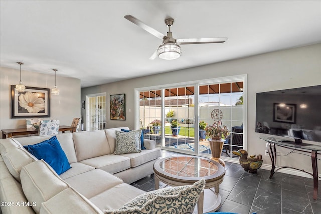 living room with ceiling fan