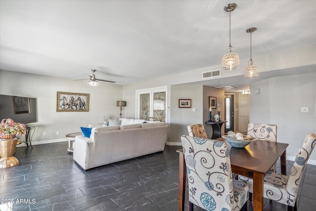 dining room with ceiling fan