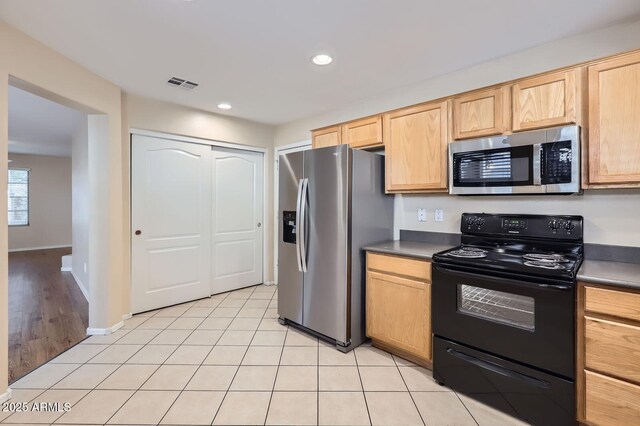 2862 E Megan St, Gilbert, AZ 85295 - kitchen with appliances with stainless steel finishes, light brown cabinets, dark countertops, recessed lighting, and light tile patterned floors
