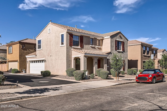 2862 E Megan St, Gilbert, AZ 85295 - view of property featuring a tiled roof, a garage, stucco siding, driveway, and a residential view
