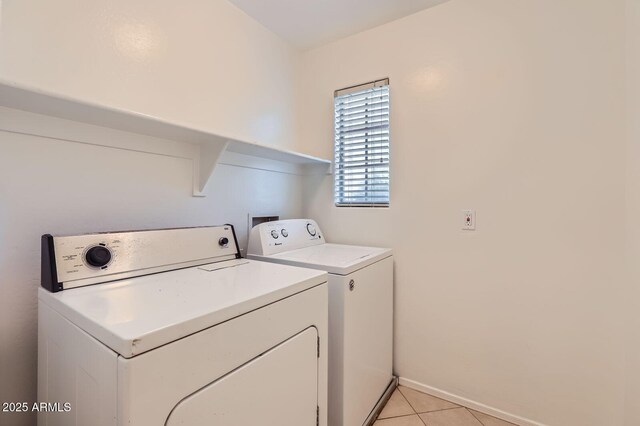 2862 E Megan St, Gilbert, AZ 85295 - washroom featuring washer and dryer, baseboards, and light tile patterned floors