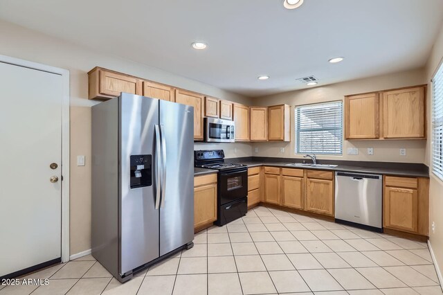 2862 E Megan St, Gilbert, AZ 85295 - kitchen with appliances with stainless steel finishes, a sink, dark countertops, plenty of natural light, and recessed lighting