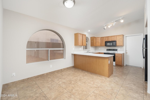 kitchen with kitchen peninsula, vaulted ceiling, sink, black appliances, and light tile patterned floors