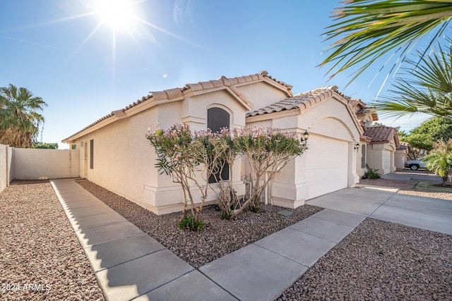 view of front of property with a garage