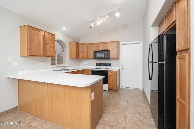 kitchen featuring kitchen peninsula, light tile patterned flooring, lofted ceiling, and black appliances