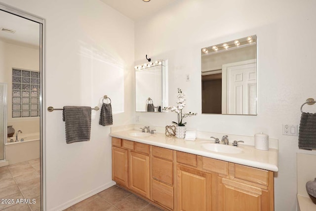 bathroom with tile patterned floors, vanity, and plus walk in shower