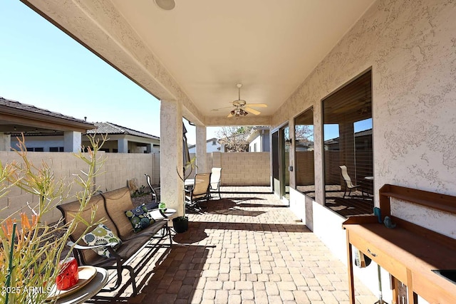 view of patio / terrace with ceiling fan