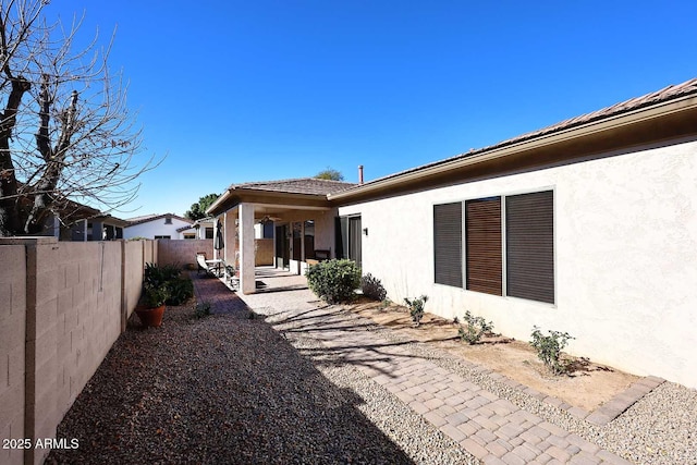 back of house with a patio area