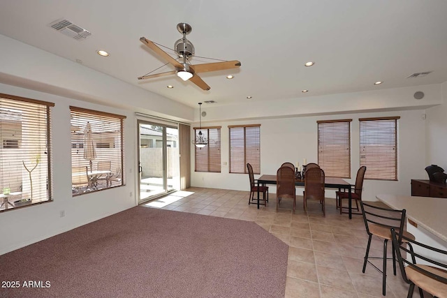 dining room with ceiling fan and light tile patterned floors