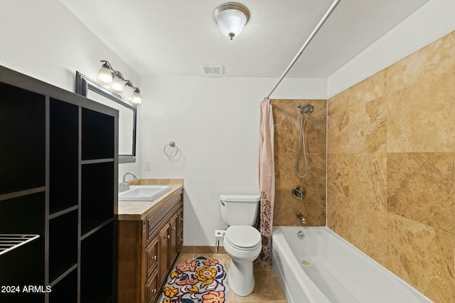 full bathroom featuring tile patterned floors, vanity, toilet, and shower / bath combo with shower curtain