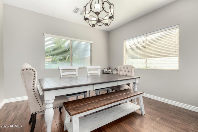 1429 E Lowell Ave, Gilbert, AZ 85295 - dining space with a chandelier, baseboards, and wood finished floors
