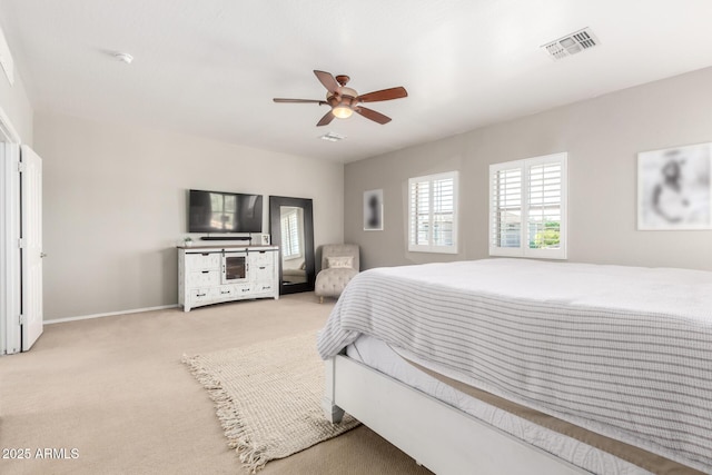 1429 E Lowell Ave, Gilbert, AZ 85295 - bedroom with carpet floors, multiple windows, a ceiling fan, and baseboards