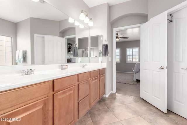 1429 E Lowell Ave, Gilbert, AZ 85295 - ensuite bathroom with ceiling fan, double vanity, and tile patterned floors