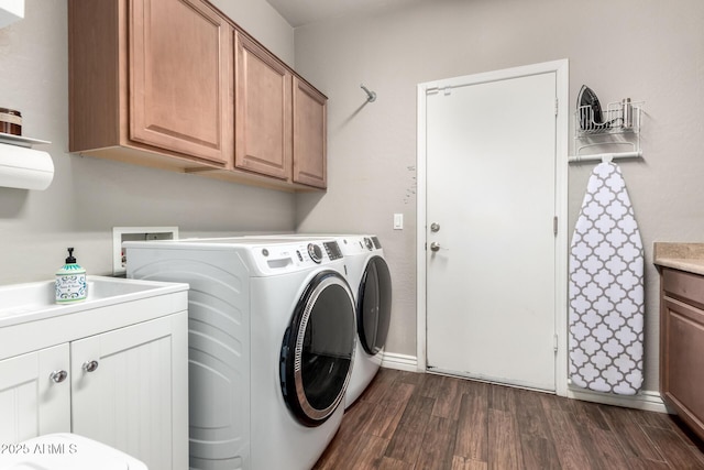 1429 E Lowell Ave, Gilbert, AZ 85295 - laundry room featuring washer and dryer, dark wood finished floors, and cabinet space