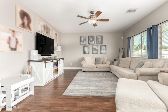 1429 E Lowell Ave, Gilbert, AZ 85295 - living area featuring ceiling fan, dark wood-style floors, and baseboards
