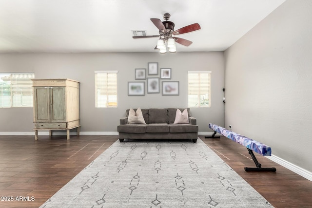 1429 E Lowell Ave, Gilbert, AZ 85295 - living area with a ceiling fan, healthy amount of natural light, and baseboards
