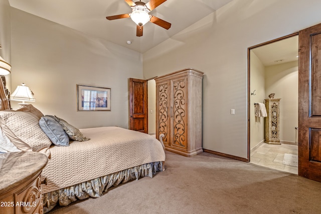 bedroom with ceiling fan and light carpet