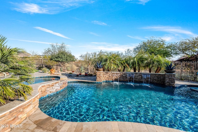 view of swimming pool featuring pool water feature