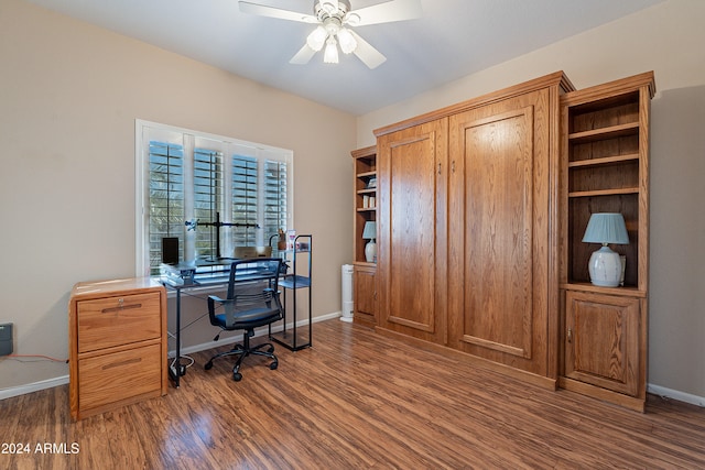 office featuring dark hardwood / wood-style floors and ceiling fan