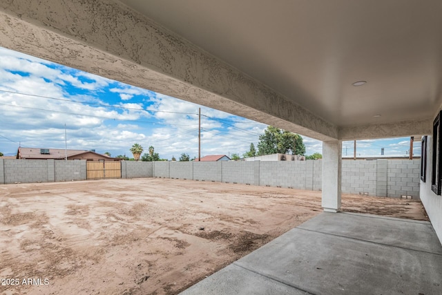 view of yard with a fenced backyard and a patio