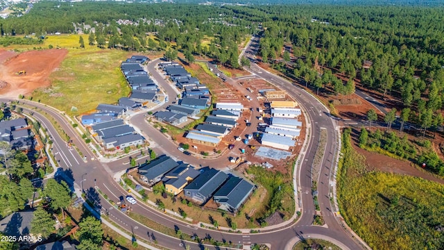 aerial view featuring a forest view