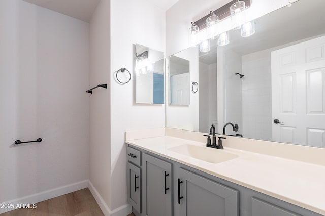 101 N 7th St Unit 168, Phoenix, AZ 85034 - bathroom with vanity, wood finished floors, and a shower