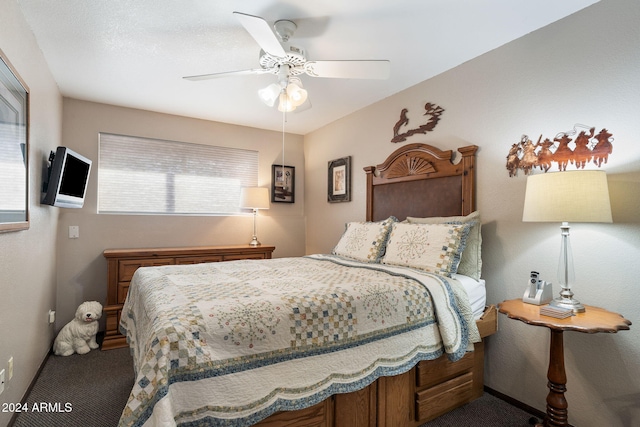 carpeted bedroom with ceiling fan