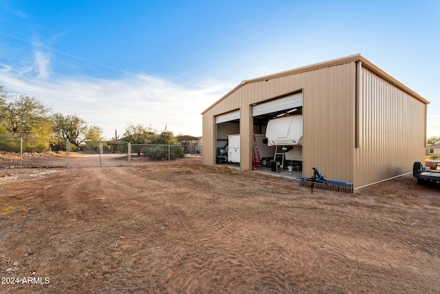 view of outbuilding with a garage