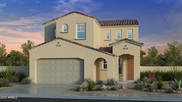 mediterranean / spanish-style home featuring a garage