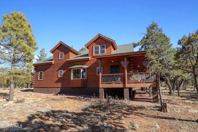 log home with a deck