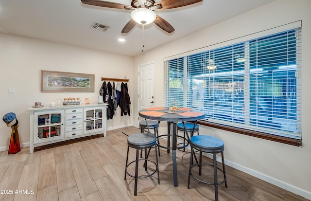 7226 E Virginia Ave, Scottsdale, AZ 85257 - dining room with wood finished floors, baseboards, ceiling fan, and recessed lighting