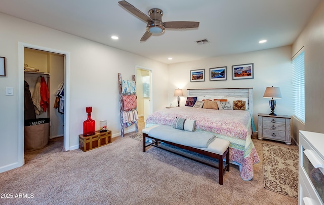 7226 E Virginia Ave, Scottsdale, AZ 85257 - bedroom featuring a spacious closet, light carpet, a ceiling fan, recessed lighting, and a closet