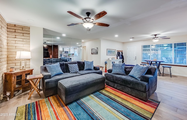 7226 E Virginia Ave, Scottsdale, AZ 85257 - living area featuring a ceiling fan, light wood finished floors, healthy amount of natural light, and recessed lighting
