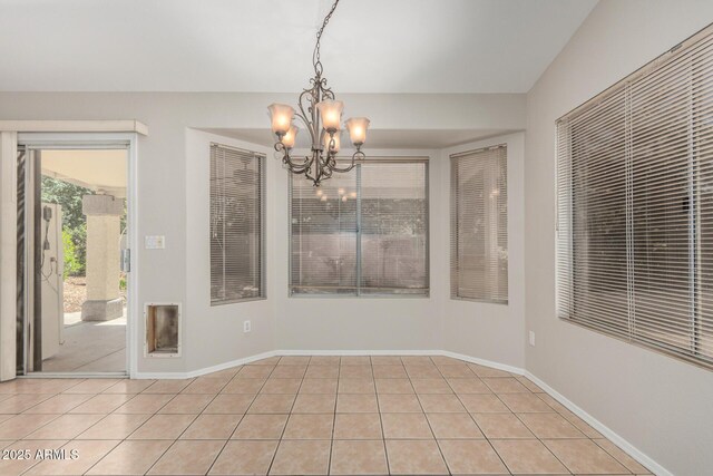 1915 E Golden Ct, Chandler, AZ 85225 - unfurnished dining area featuring baseboards, a notable chandelier, and light tile patterned floors