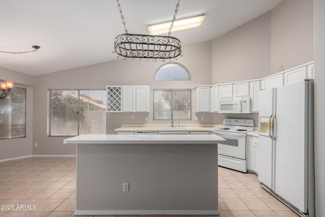 1915 E Golden Ct, Chandler, AZ 85225 - kitchen with light countertops, white appliances, a sink, and light tile patterned floors