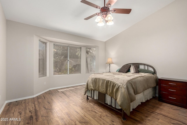 1915 E Golden Ct, Chandler, AZ 85225 - bedroom with lofted ceiling, a ceiling fan, hardwood / wood-style floors, and baseboards
