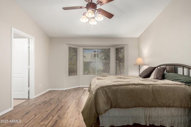 1915 E Golden Ct, Chandler, AZ 85225 - bedroom with baseboards, vaulted ceiling, wood finished floors, and ceiling fan