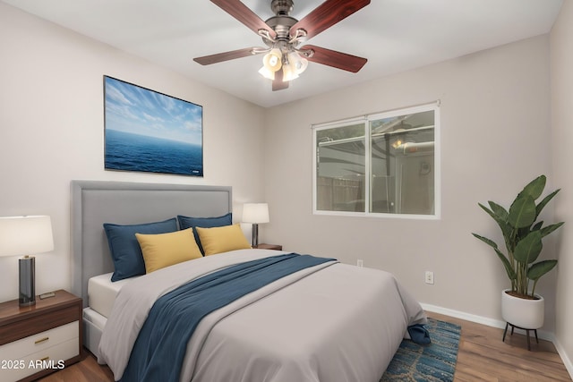 1915 E Golden Ct, Chandler, AZ 85225 - bedroom featuring baseboards, a ceiling fan, and wood finished floors