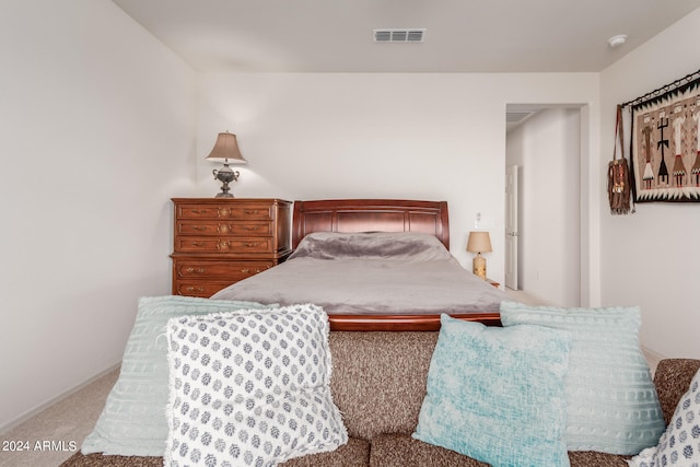 bedroom with light carpet