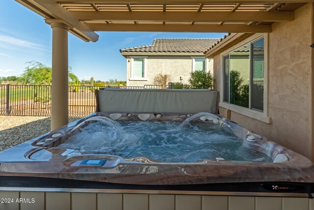 view of patio featuring a hot tub