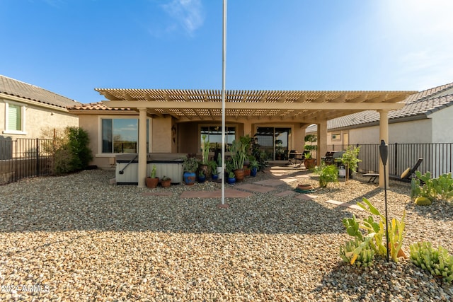 rear view of house with a patio