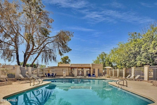 view of swimming pool with a patio area