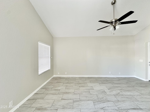 unfurnished room with ceiling fan and vaulted ceiling