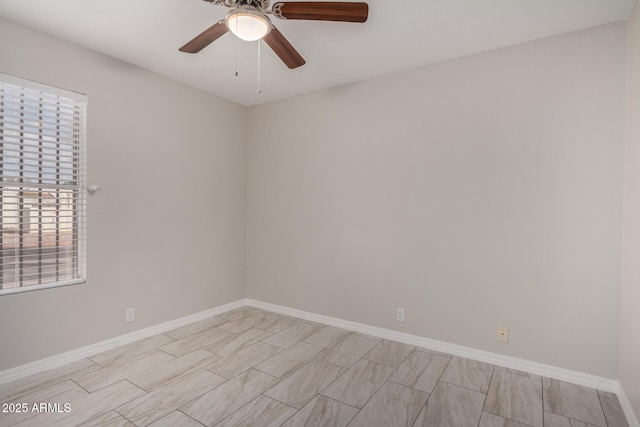 spare room featuring ceiling fan