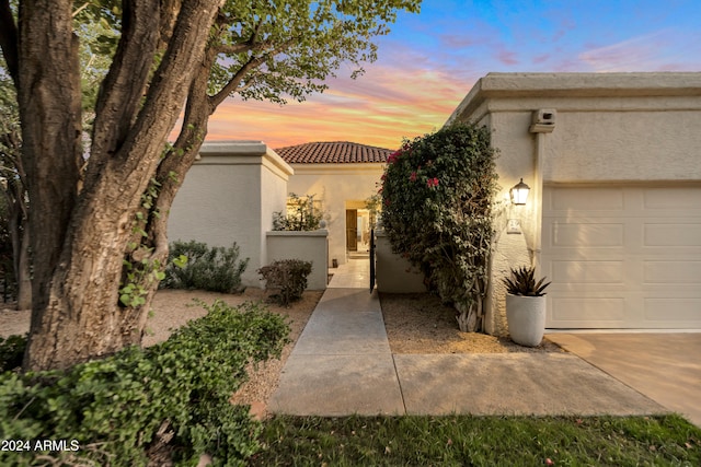 view of front of property featuring a garage